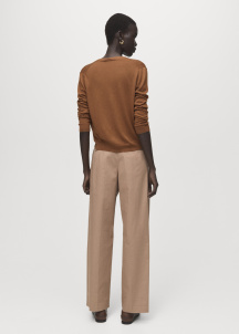 Плетена жилетка с V-образно деколте