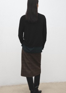 Плетена жилетка с V-образно деколте